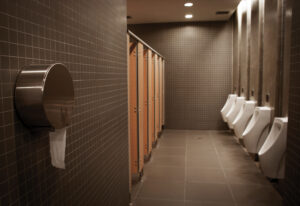 silhouete toilet men room in brown interior